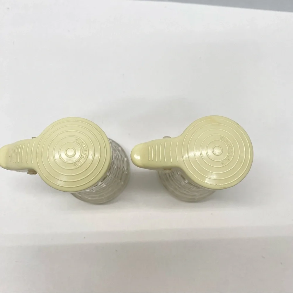 Vintage Daniells Salt and Pepper Shakers Set Beige Top Glass Bottom Plastic Tops